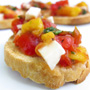 Hello, from Florida: Mango, tomato & queso blanco bruschetta, Honest Fare by Gabrielle Arnold